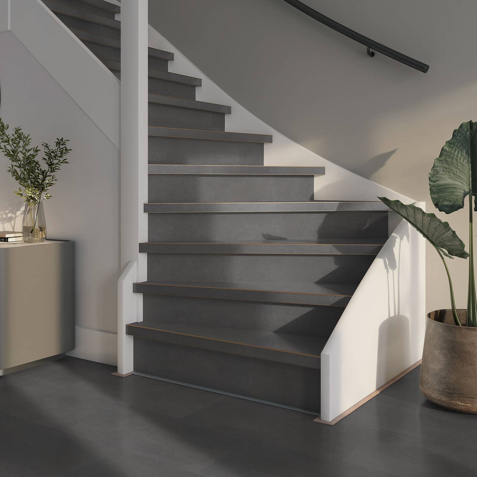 Detail van een PVC traprenovatie met betonlook